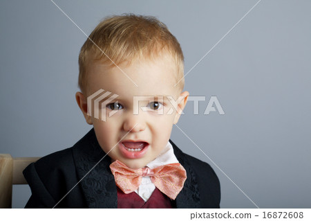 little angry gentleman on grey 16872608