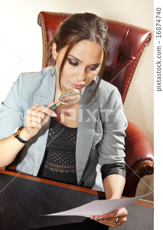 adviser with magnifying glass 16874740