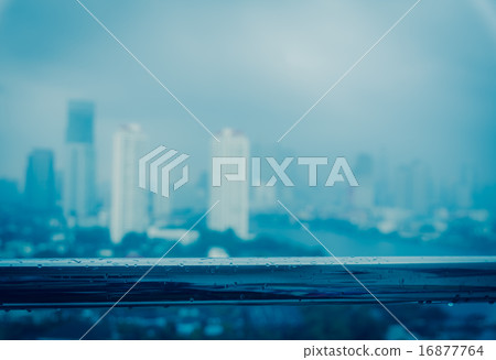 cityscape blur photo with rains 16877764