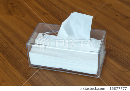 Tissue box on wood background Tissue box on wood background 16877777