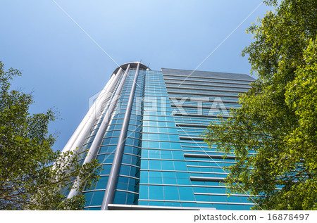 Modern business building glass of skyscrapers with sun 16878497