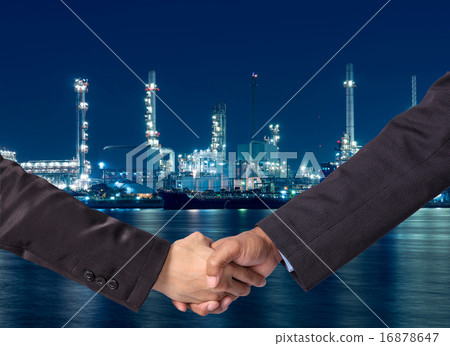 Hand shake between a businessman on Petrochemical factory backgr 16878647