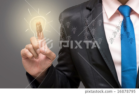 Businessman pointing or touching on the idea of success Businessman pointing or touching on the idea of success 16878795