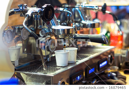 Coffee machine making espresso shot in a cafe shop 16879465