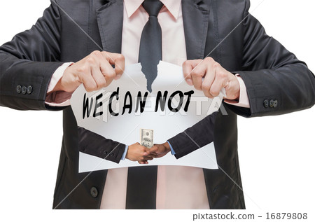 Businessman ripping up the WE CAN NOT sign with Hand shake betwe 16879808