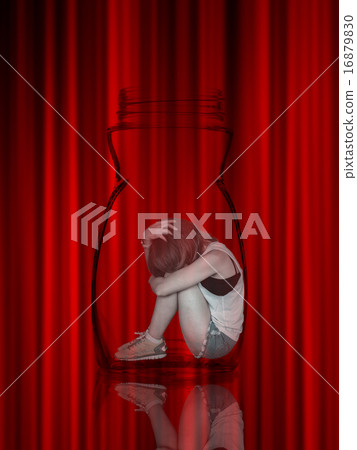 Sad woman sitting alone in a jar Sad woman sitting alone in a jar 16879830