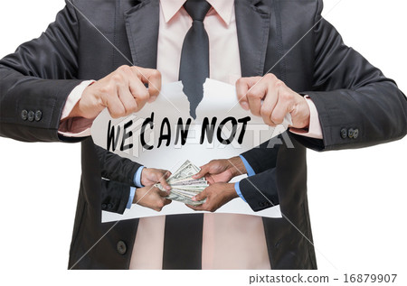 Businessman ripping up the WE CAN NOT sign with receiving the mo 16879907