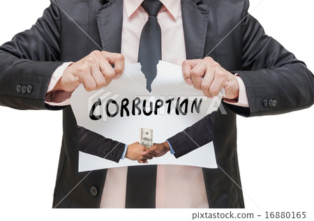 Businessman ripping up the CORRUPTION sign with Hand shake betwe 16880165