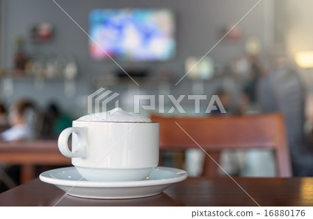 Coffee cup on coffee shop blur background 16880176