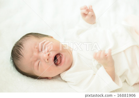 Newborn baby crying over white spirit 16881906
