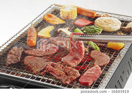 Grab meat with BBQ Tong Grab meat with BBQ Tong 16883919