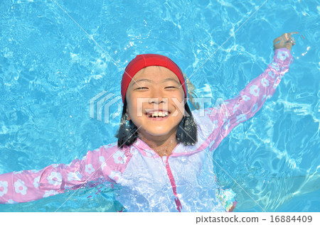Girls playing in the pool Girls playing in the pool 16884409