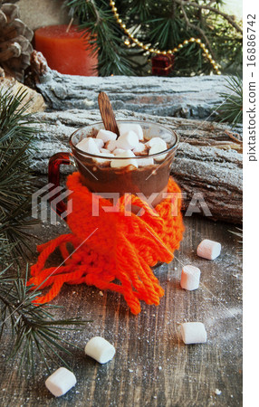 cup of hot chocolate with marshmallows and a scarf cup of hot chocolate with marshmallows and a scarf 16886742