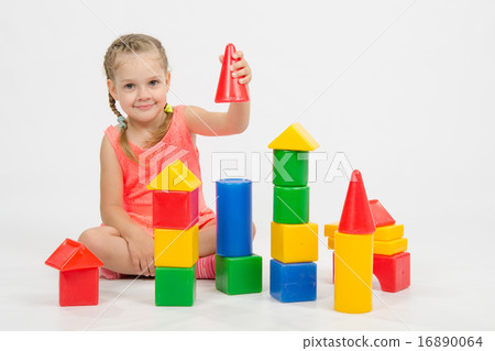 four-year child is having fun playing with blocks four-year child is having fun playing with blocks 16890064