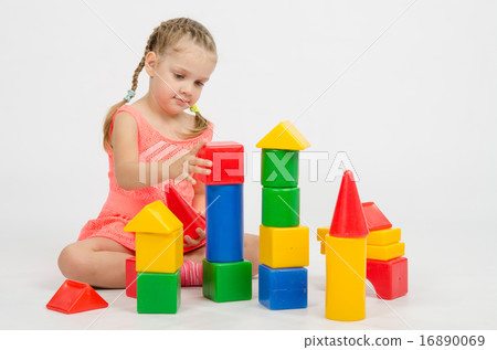 Girl collects house of cubes Girl collects house of cubes 16890069