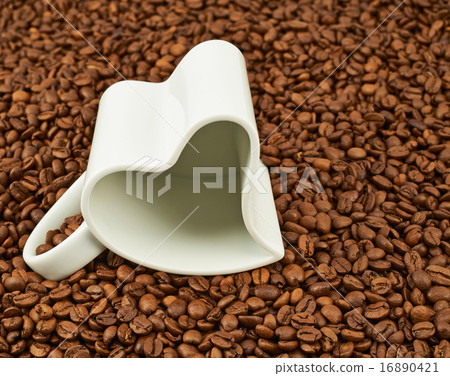Cup on coffee beans 16890421