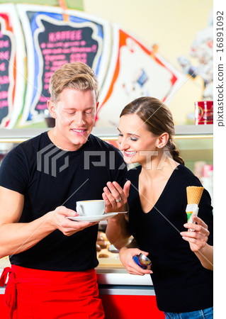 Ice cream seller and waiter working in cafe Ice cream seller and waiter working in cafe 16891092