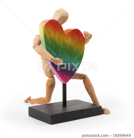 Wooden mannequin with a big heart Wooden mannequin with a big heart 16899649