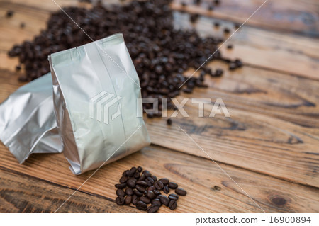 New coffee foil bag on wood table New coffee foil bag on wood table 16900894