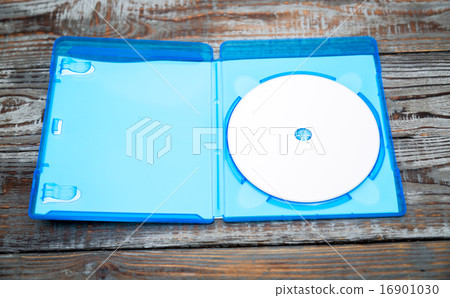 Blank compact disc with cover on wood background ground Blank compact disc with cover on wood background ground 16901030