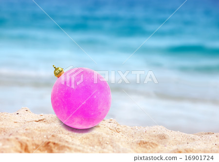 New Year's ball on a beach near the sea New Year's ball on a beach near the sea 16901724