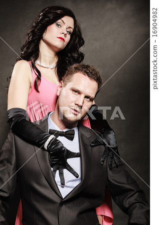 Portrait of elegant couple in the tender passion. 16904982