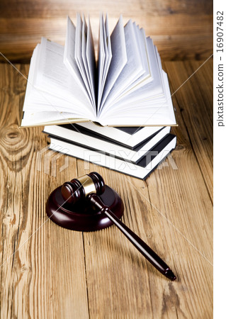 Gavel on books, ambient light vivid theme Gavel on books, ambient light vivid theme 16907482