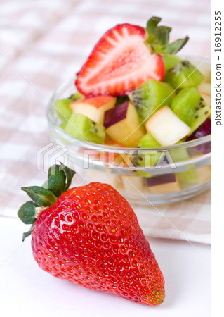 Strawberry and fruit salad in white plate Strawberry and fruit salad in white plate 16912255