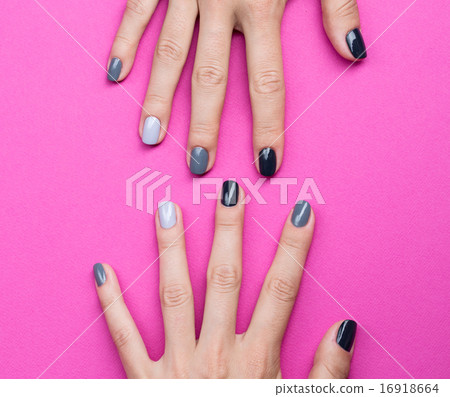 Delicate female hands with a stylish neutral manicure Delicate female hands with a stylish neutral manicure 16918664