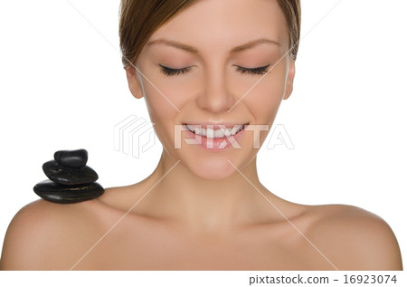 pile stones on shoulder of beautiful 16923074