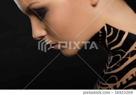 Portrait of beautiful young woman, black body art Portrait of beautiful young woman, black body art 16923269