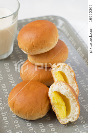 Stacked cream bread and milk (vertical position) 16930363