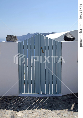 blue wooden gates , Santorini island, Greece blue wooden gates , Santorini island, Greece 16931714