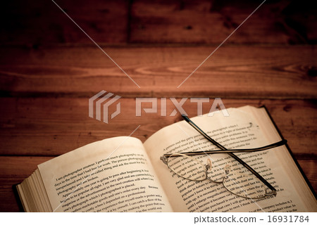 Autumn image of reading (Old book and glasses) 16931784
