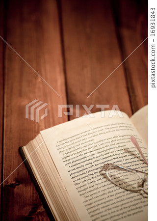 Autumn image of reading (Old book and women's glasses) 16931843