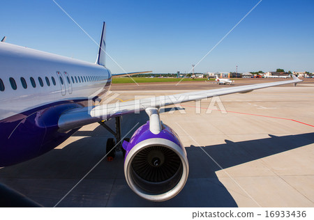 Airplane at terminal gate preparing the takeoff. 16933436