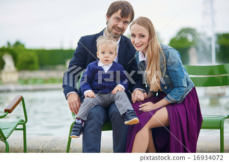 Happy family of three in Paris Happy family of three in Paris 16934072