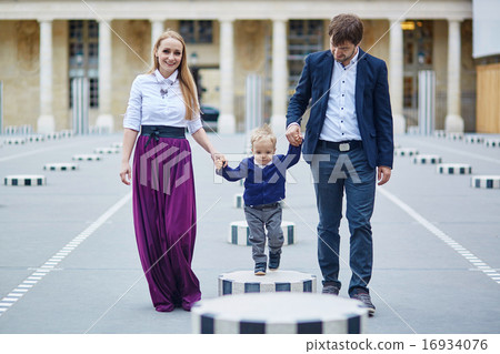 Happy family of three in Paris Happy family of three in Paris 16934076