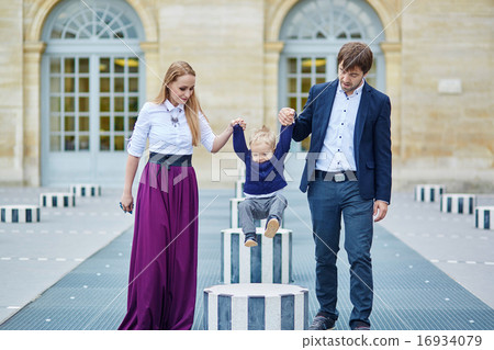 Happy family of three in Paris Happy family of three in Paris 16934079