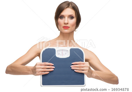 Beautiful woman holding weighs Beautiful woman holding weighs 16934878