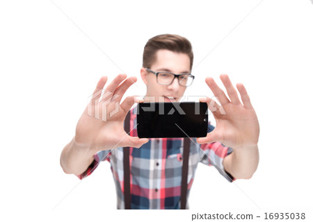 Nerd in glasses and checkered shirt Nerd in glasses and checkered shirt 16935038