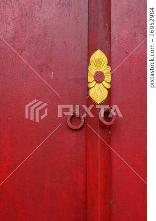 Red wooden door with texture at Khmer temple Red wooden door with texture at Khmer temple 16952984