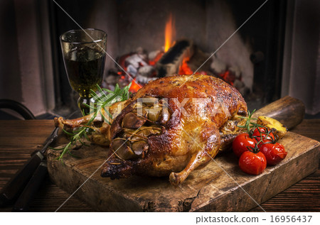 duck roasted with apple duck roasted with apple 16956437