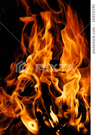 Close-up of fire on a black Close-up of fire on a black 16958340