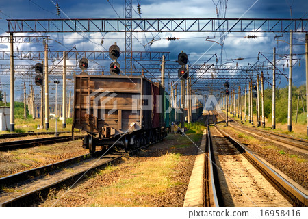 The railroad train with cars 16958416