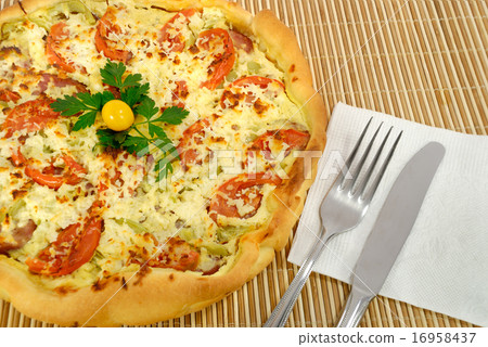 Homemade whole pizza on a mat Homemade whole pizza on a mat 16958437