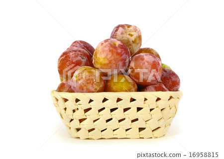 Basket with plums 16958815