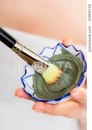 Skin care. Closeup of brush and clay mud mask. Skin care. Closeup of brush and clay mud mask. 16969158
