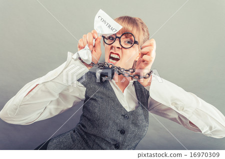 Furious woman with chained hands and contract Furious woman with chained hands and contract 16970309