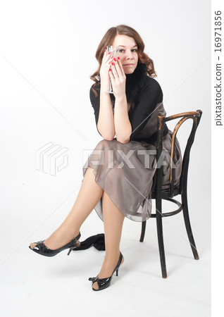 Pretty woman on chair Pretty woman on chair 16971856